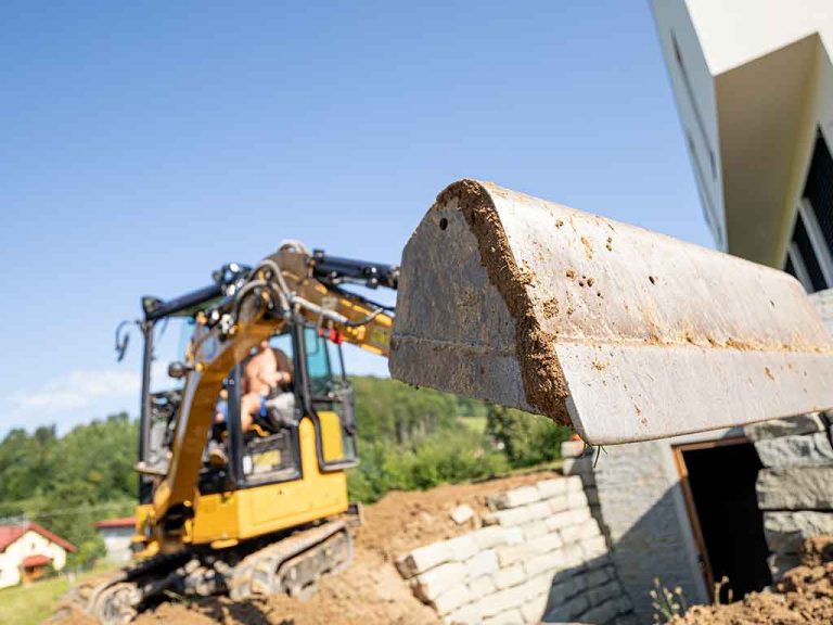 mini-excavator-bucket-closeup-during-work-on-const-2024-10-31-00-28-53-utc