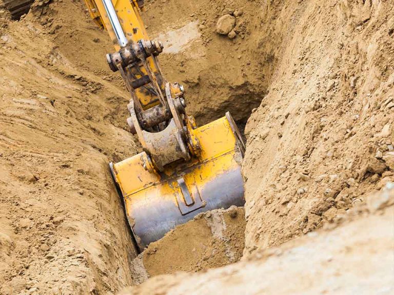 working-excavator-tractor-digging-a-trench-2024-09-11-06-10-46-utc